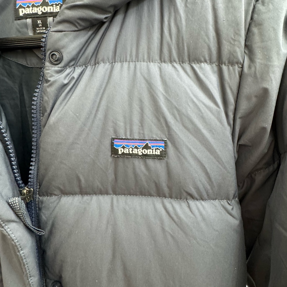 Used Patagonia children 14 XL size good for winter.